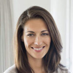 focused 224027320 stock photo portrait smiling brunette woman standing